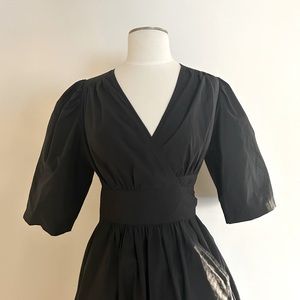 & other stories wrap midi dress with fitted bodice and voluminous skirt.